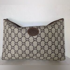 Gucci Beige and Brown Monogram Toiletry travel bag.